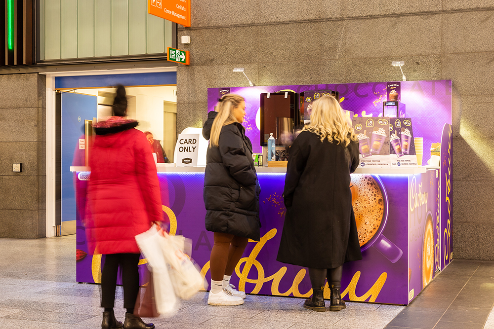 Women at a Cadburys hot chocolate stand