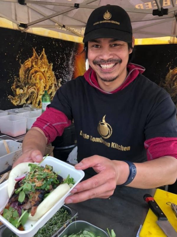 Man serving boa buns