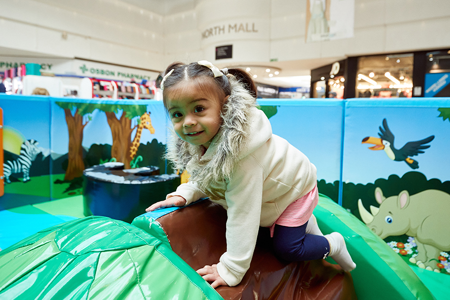 Stratford shopping centre child on soft play equipment