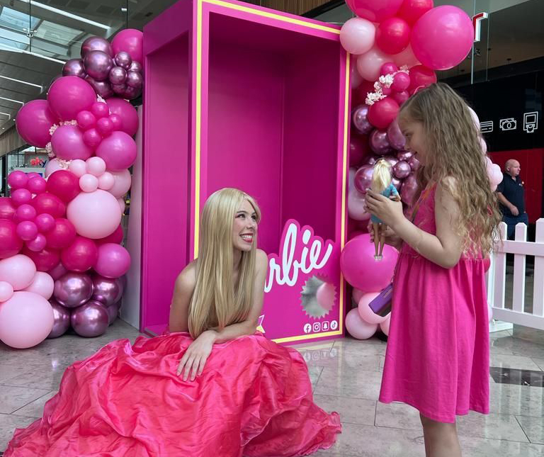 Barbie meeting small child at shopping centre event
